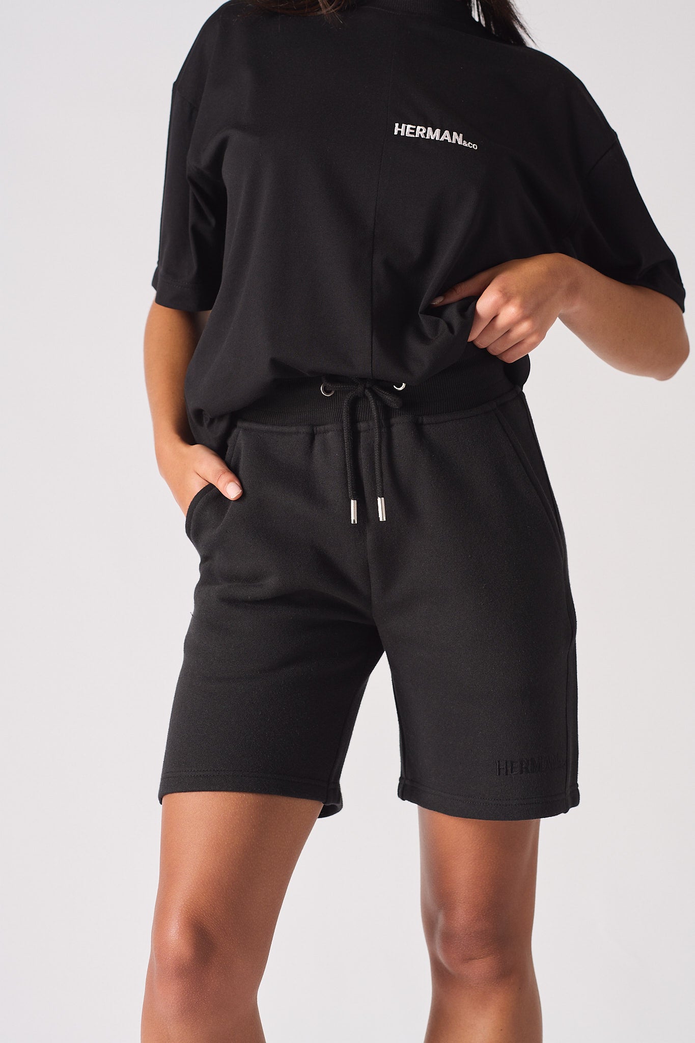 womens black shorts ribbed waistband front closeup