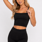 A woman posing in a Women's Black Smocked Square Neck Cami Crop Top with co-ord leggings