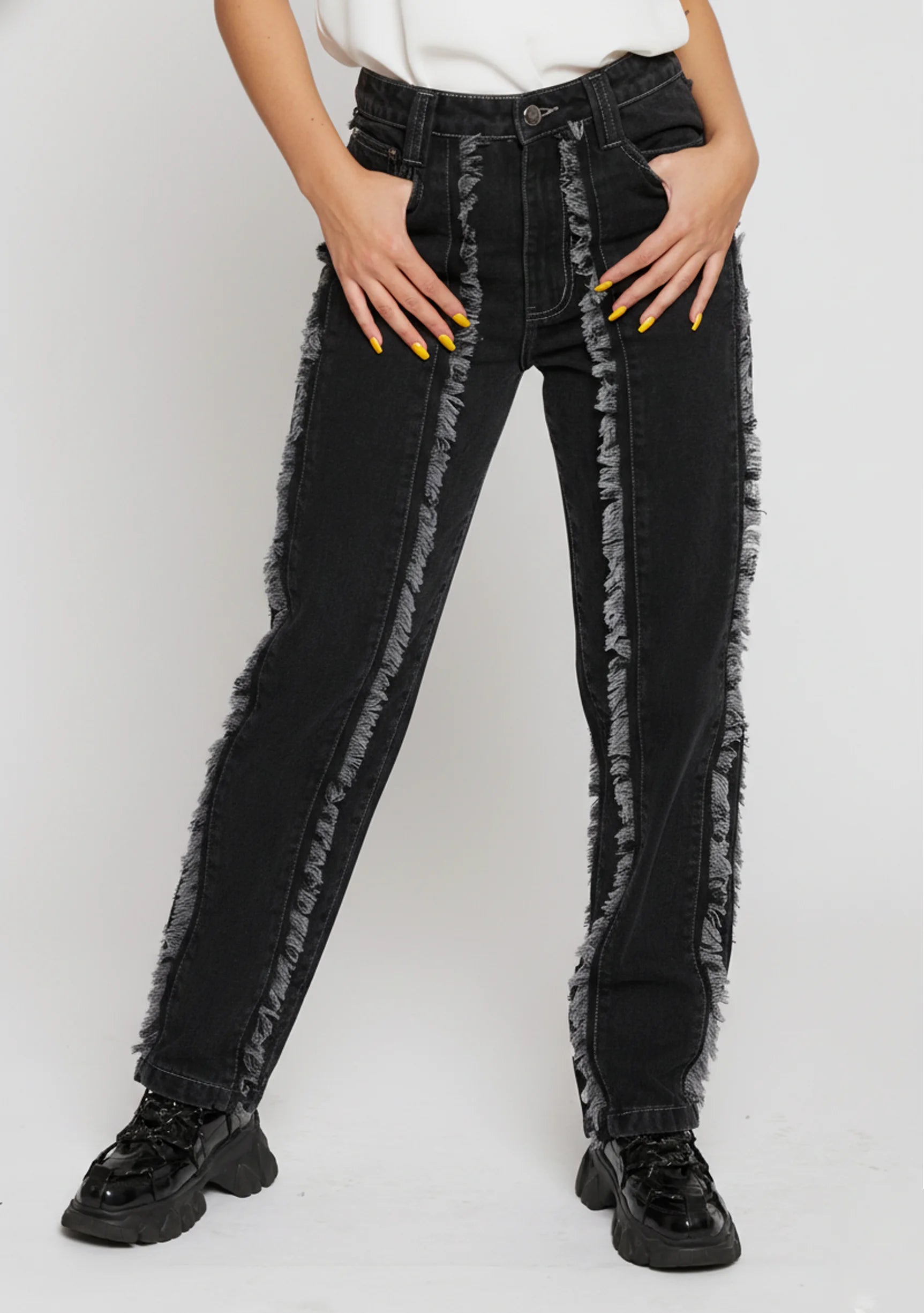 Womens Black Wash jeans front view showing hand in pocket detail