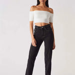 Front view of model wearing Women's Black Wash Straight Leg Popper Jeans with contrast stitching
