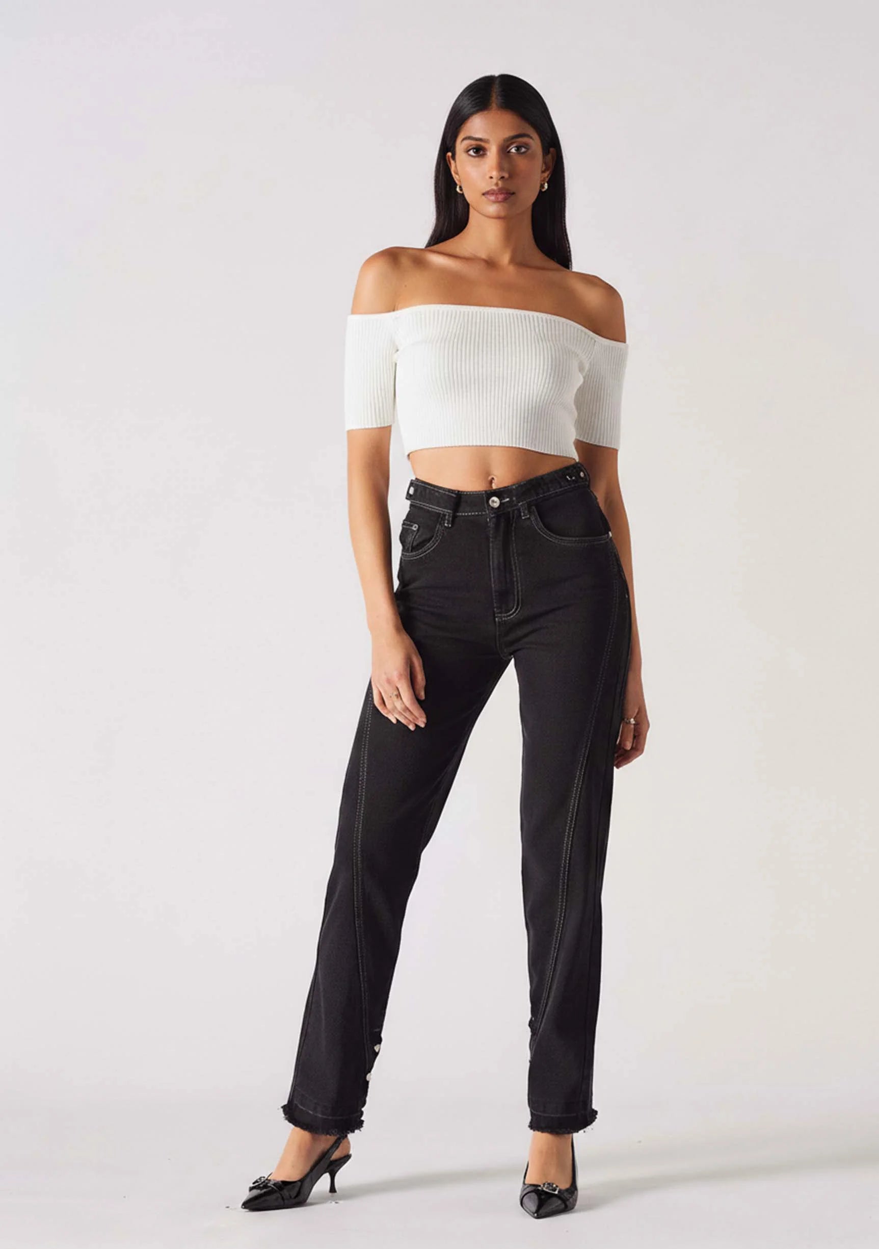 Front view of model wearing Women's Black Wash Straight Leg Popper Jeans with contrast stitching