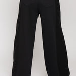 Back view of high waisted black wide leg joggers showing the relaxed fit