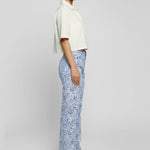 Side profile of Womens Blue Speckled straight leg jeans