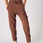 front view showing pockets on brown tapered joggers