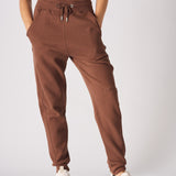 front view showing pockets on brown tapered joggers
