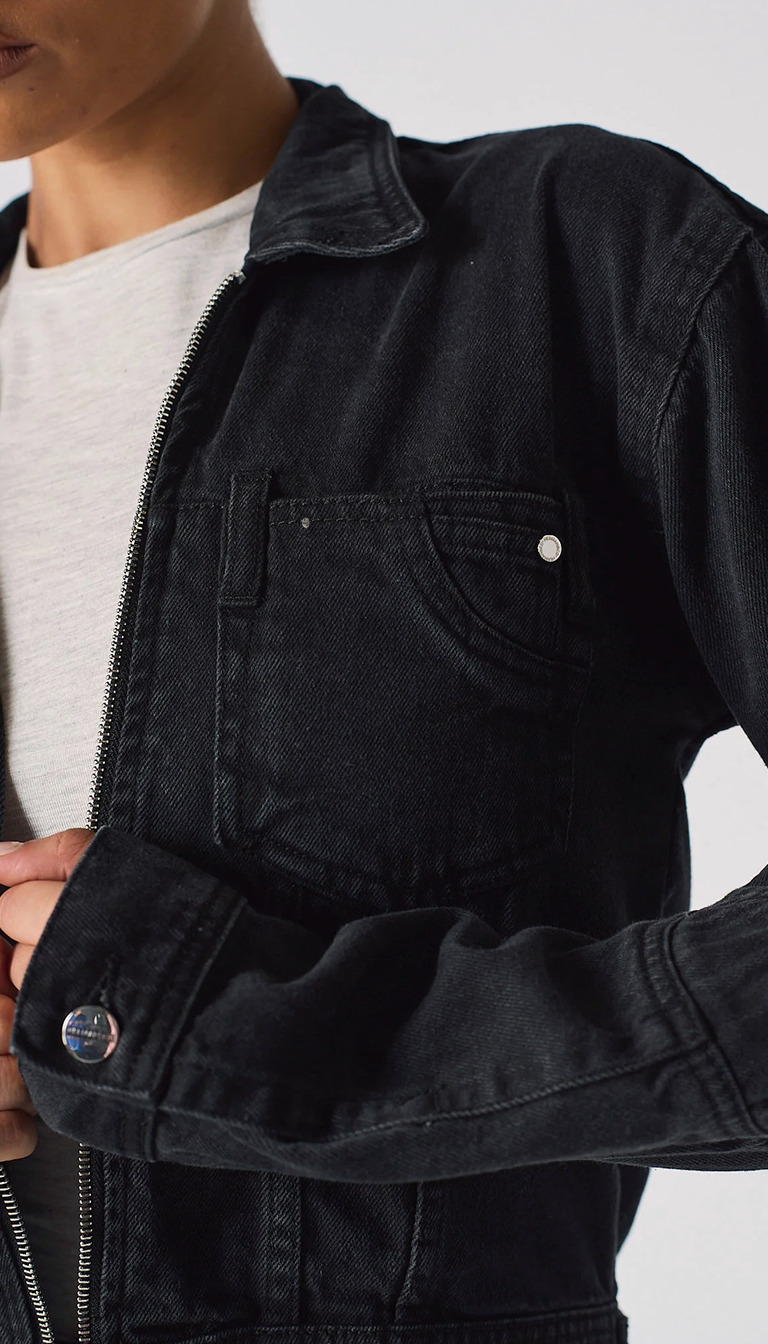 womens cropped denim jacket black wash snap button cuff close up