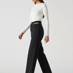 Womens cut out straight leg jeans side walking pose