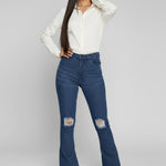 Womens dark blue distressed flare jeans front view
