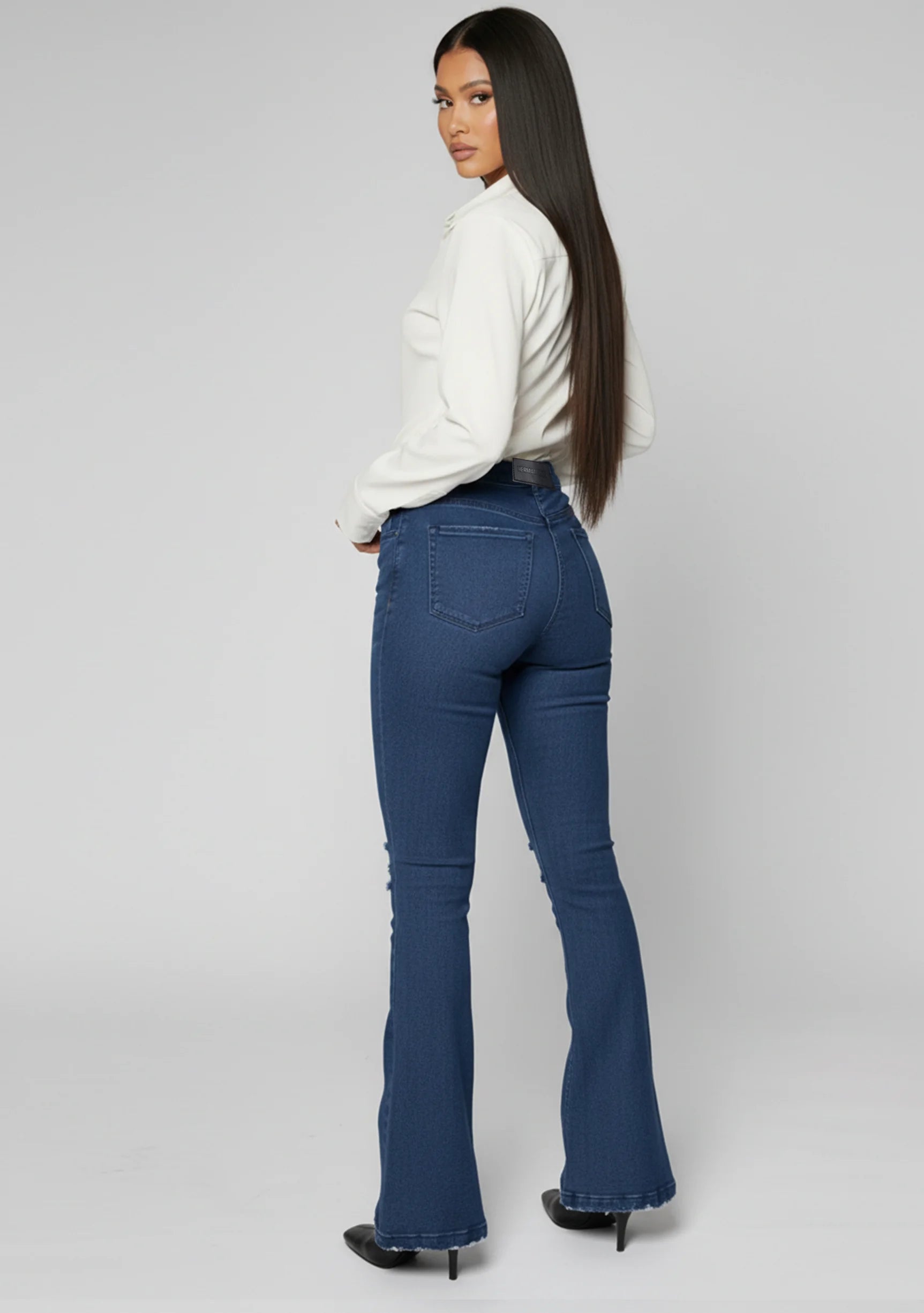 Womens dark blue flare jeans back angle fit
