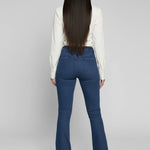 Womens dark blue flare jeans back view with pocket details