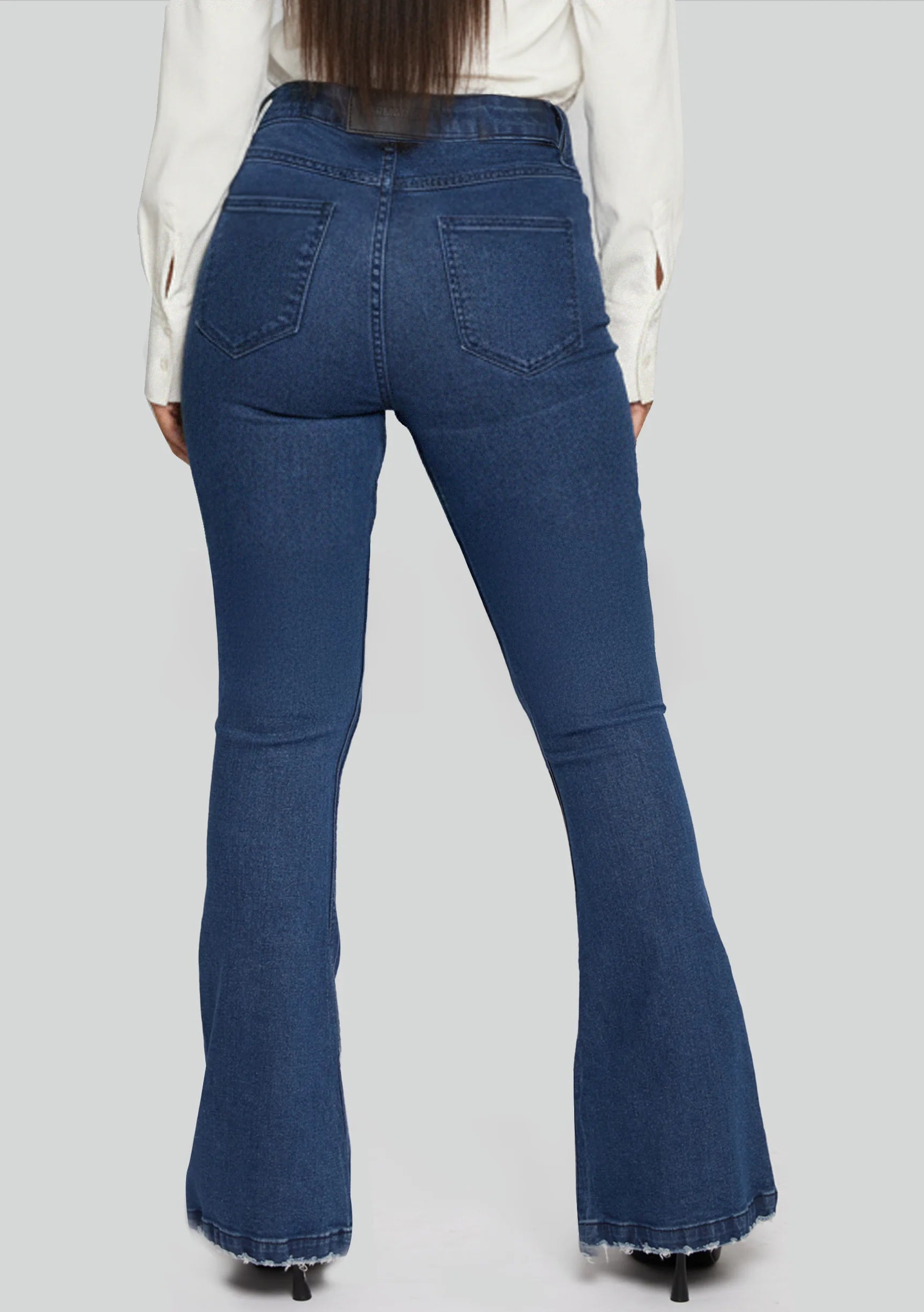 Womens dark blue flare jeans back pocket detail close up