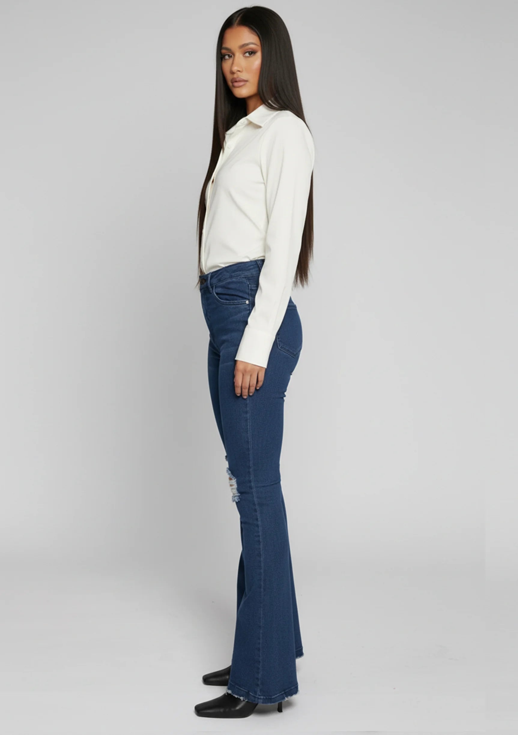 Womens dark blue flare jeans side profile fit