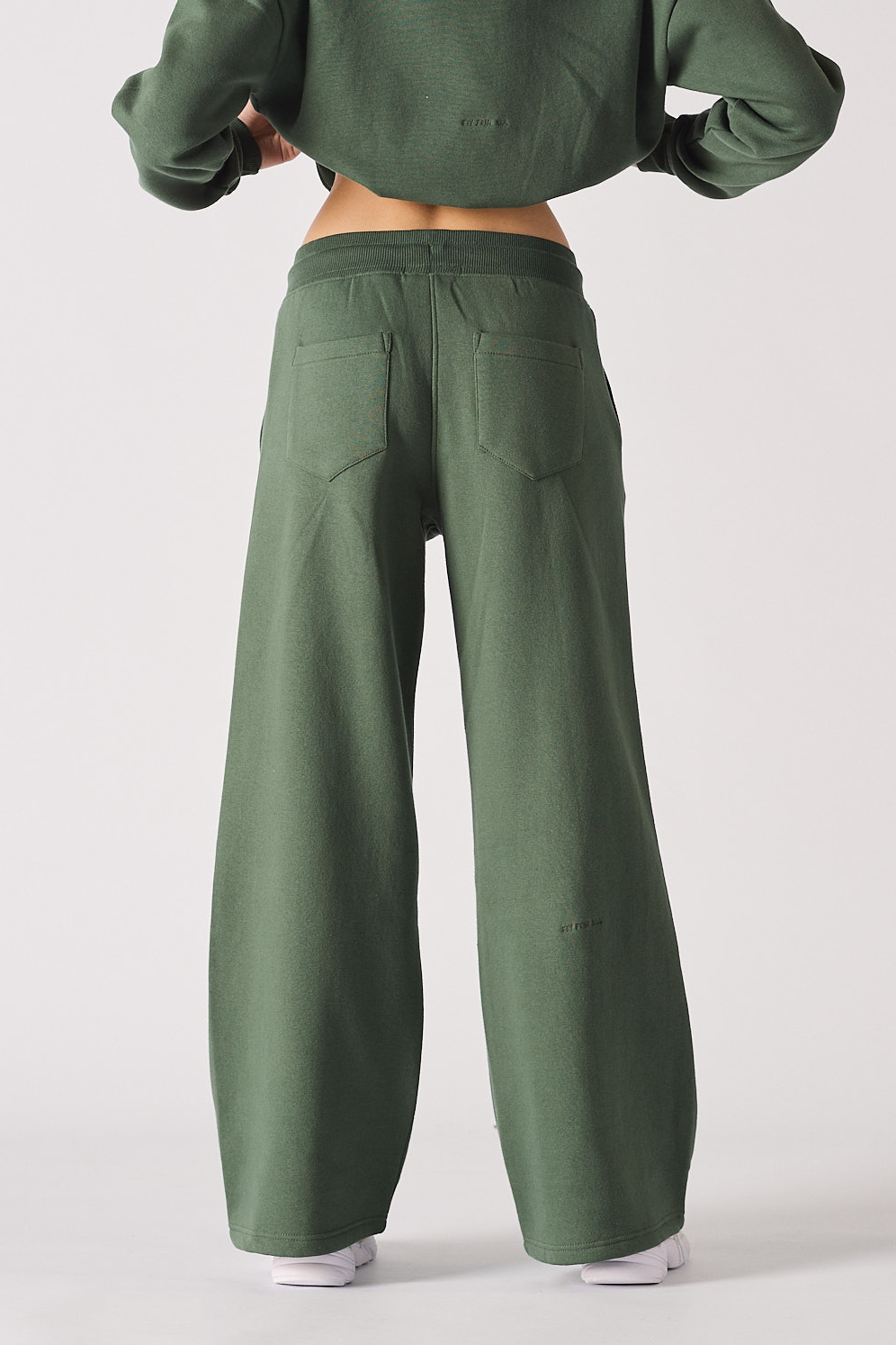 Womens dark green wide leg joggers back view