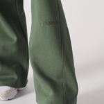 Womens dark green wide leg joggers front flat lay