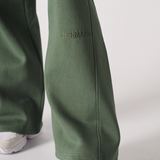 Womens dark green wide leg joggers front flat lay