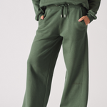Womens dark green wide leg joggers front view