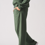 Womens dark green wide leg joggers side profile