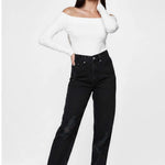 Model with hand behind her neck posing in Women's Everyday Black Wash Straight Jeans