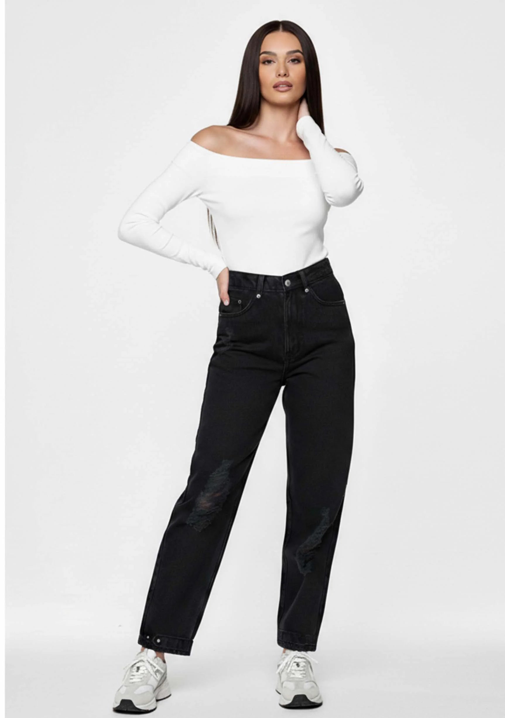 Model with hand behind her neck posing in Women's Everyday Black Wash Straight Jeans