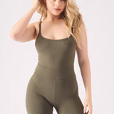 Close up front shot showing the scoop neckline on a green unitard for women