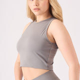Close up profile of the soft stretchy fabric on a grey crop top