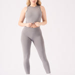 Full front view of a grey crop top for women with a high neck design