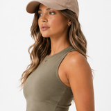 Side view of a woman in a Women's Khaki Sleeveless Racer Neck Crop Top