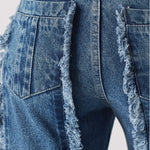 Back pocket and frayed seam detail on Womens Mid Blue Wash jeans