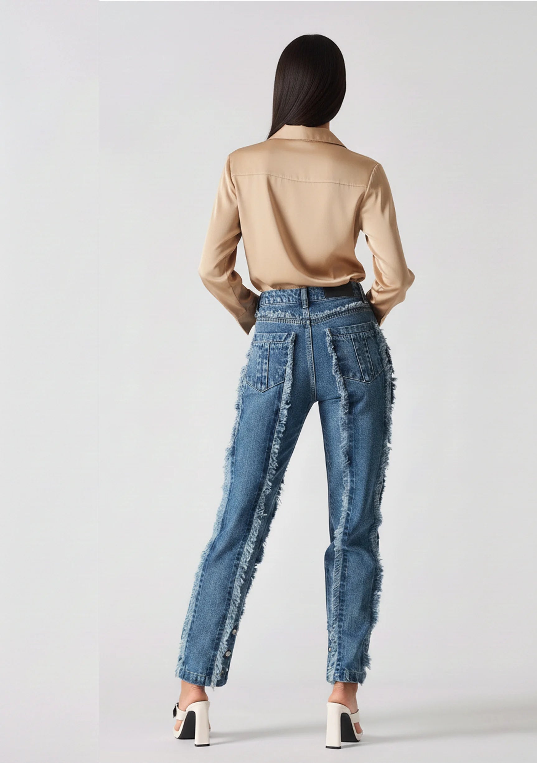 Back view of Womens Mid Blue Wash straight leg frayed jeans