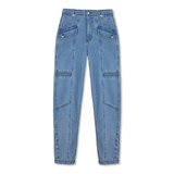 Front view of the women's mid-wash cargo denim jean laid flat.