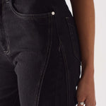 Close-up of the contrast side seam on Women's Popper Detail Black Jeans