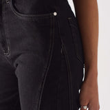 Close-up of the contrast side seam on Women's Popper Detail Black Jeans