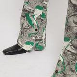 Close-up of the hem on the women's printed jeans.