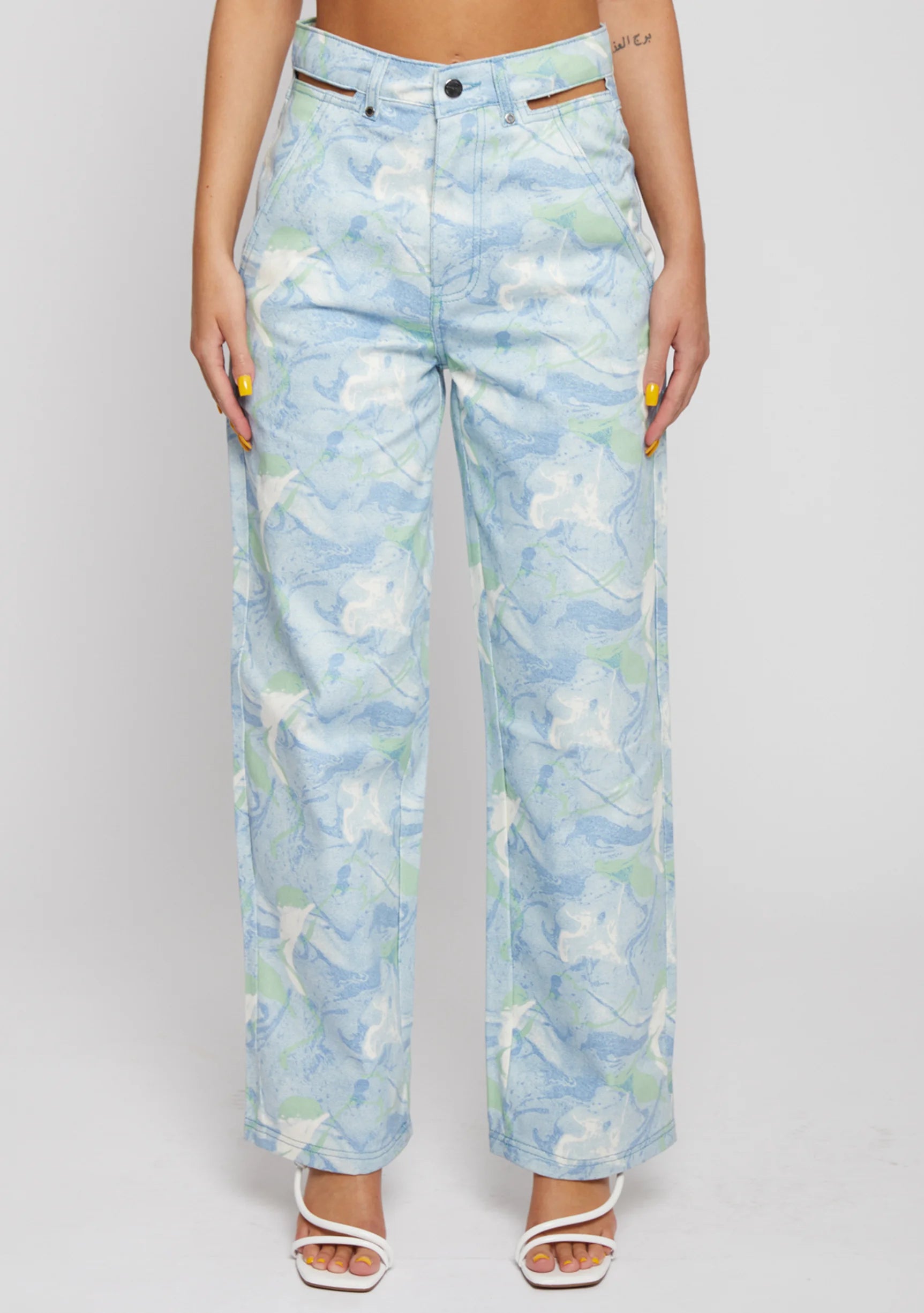 womens psychedelic marble jeans front closeup