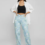 Front view of Womens Psychedelic Marble jeans with hand on waist detail