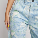 Side profile view of Womens Psychedelic Marble jeans straight leg fit