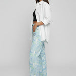 Side view of Womens Psychedelic Marble jeans showing marble print