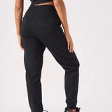Back view of womens relaxed interlock pintuck jogger in black