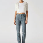 Model walking towards camera wearing Women's Statement Speckle Jeans Dark Blue Grey