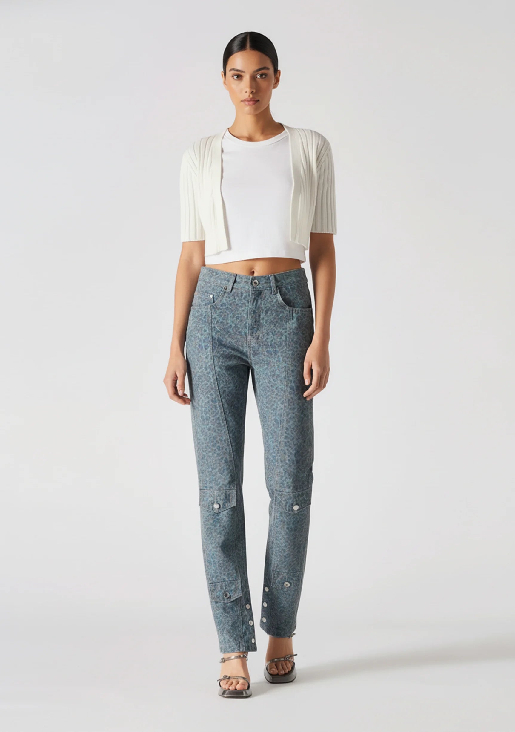Model walking towards camera wearing Women's Statement Speckle Jeans Dark Blue Grey