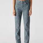 Confident pose of a model wearing Women's Vintage Speckle Jeans in Blue Grey