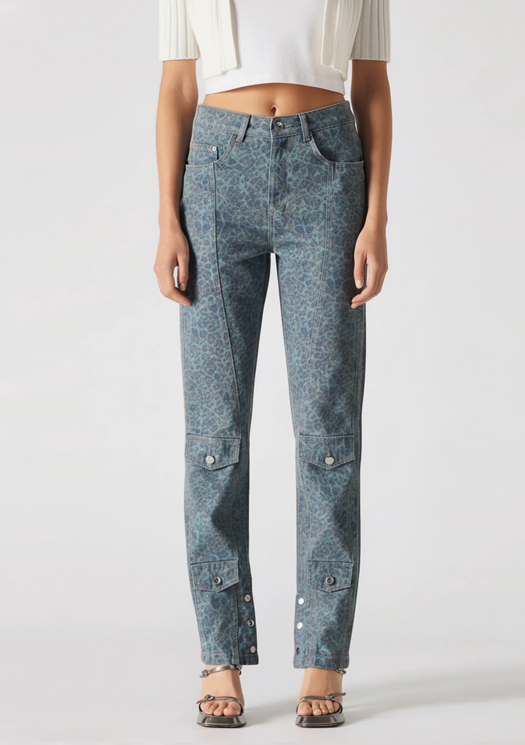 Confident pose of a model wearing Women's Vintage Speckle Jeans in Blue Grey