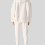 Back view showing the oversized fit of the womens white zip up hoodies.