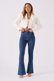 HIGH WAISTED FRAYED FLARE JEANS - MID BLUE