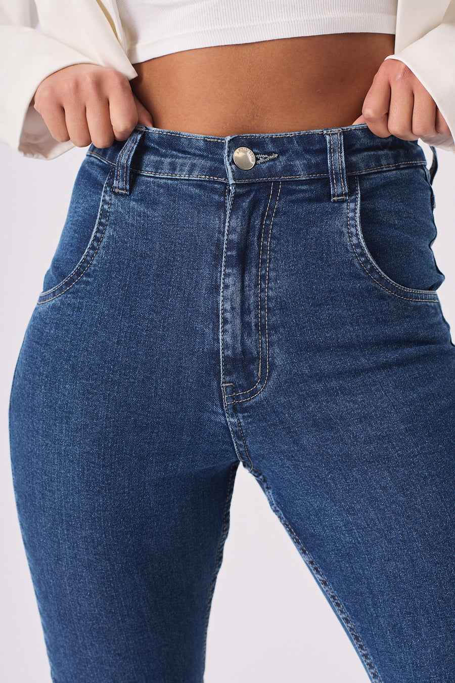 HIGH WAISTED FRAYED FLARE JEANS - MID BLUE