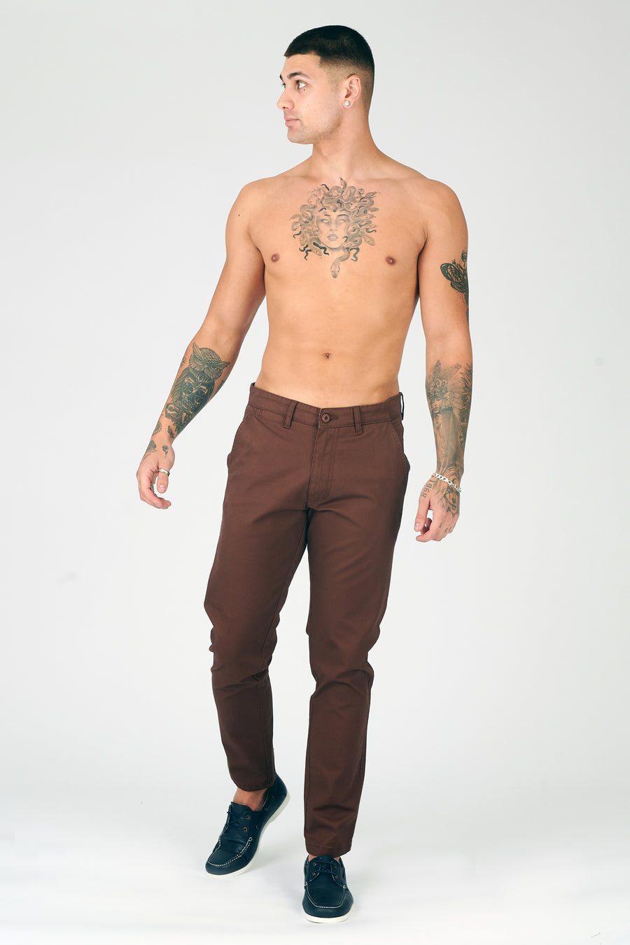Body shot of a standing male model wearing JMOJO Chocolate Brown Slim Fit Stretch Chino Trouser