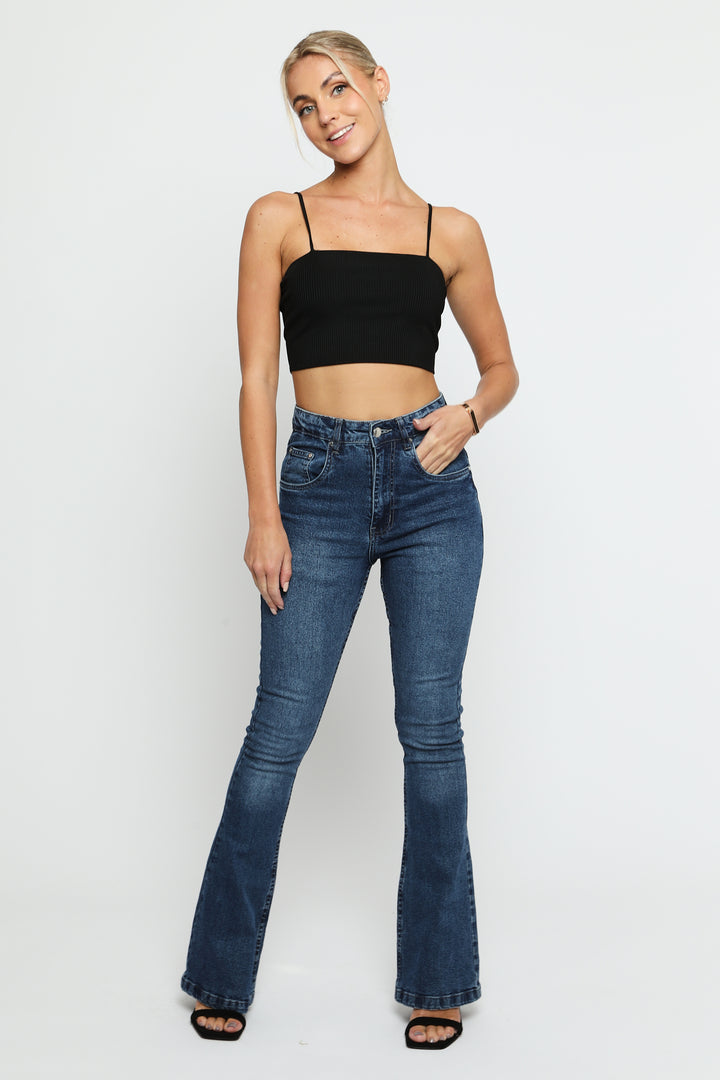 mid blue high waisted fitted flare jeans