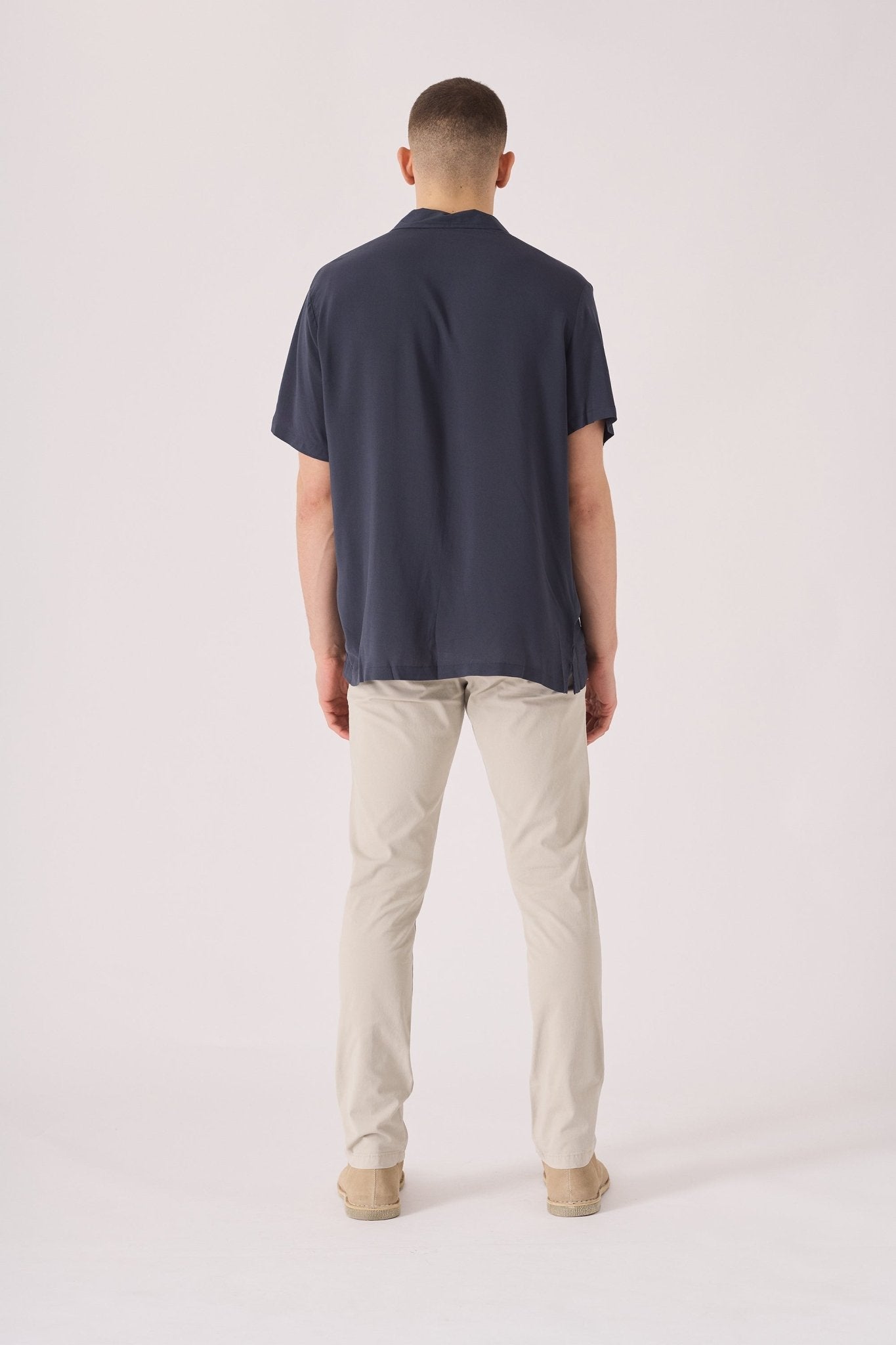 Rear view of the high quality cream chinos slim fit.