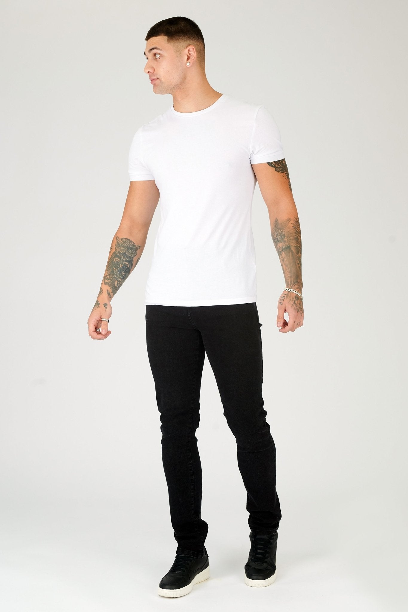 black jeans men slim fit side view full length leg