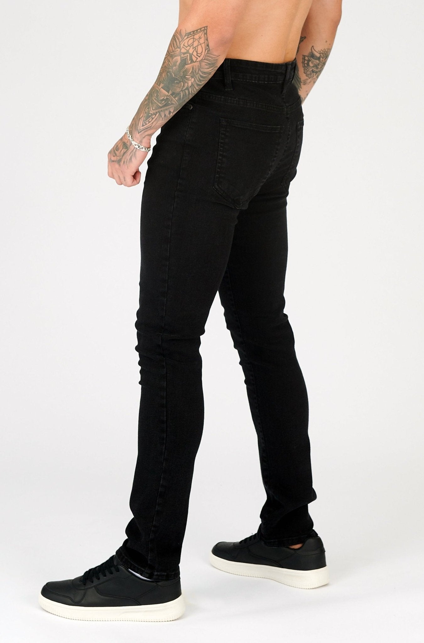 black slim fit jeans men lifestyle full outfit view